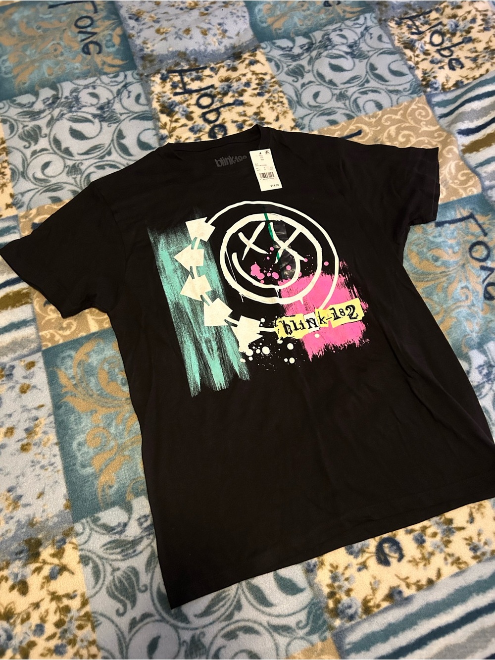 Blink-182 Women’s Short Sleeve Graphic Tee in Black with Teal & Pink Accents